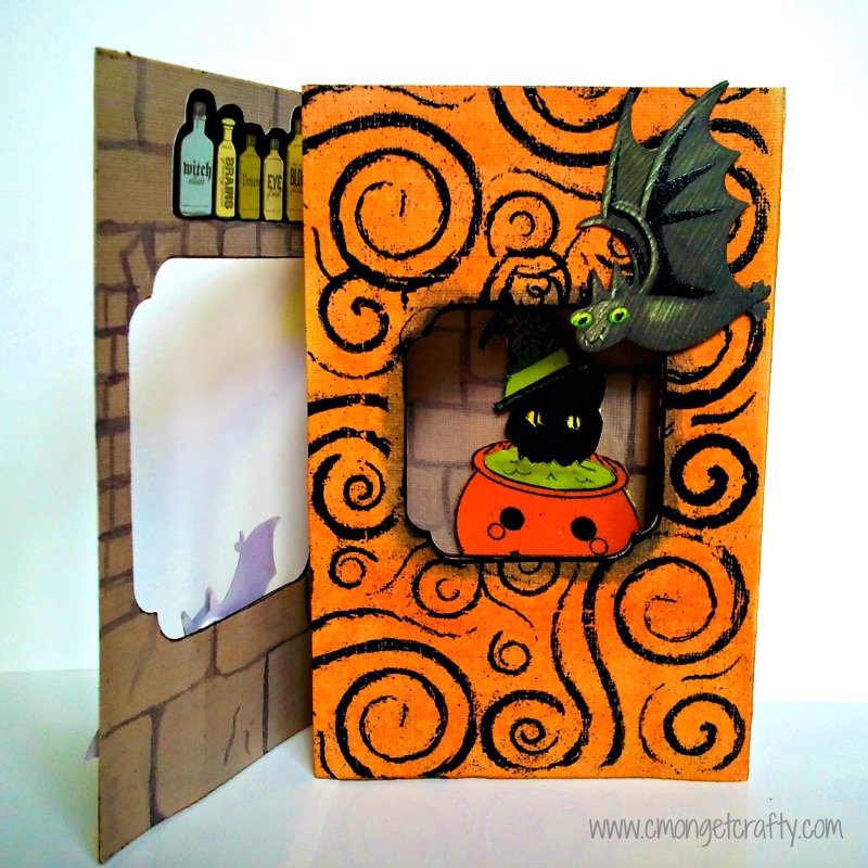 cmongetcrafty-halloweencatcard2ndpage.jpg - C'mon Get Crafty Cute handmade Halloween kitty card. Features a black cat in a cauldron, bat, and orange and black swirled design, and witchy details on the inside panel.