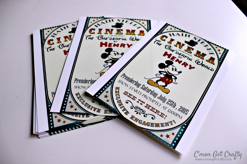 CGC Disneyland Invite 02 - C'mon Get Crafty thre printed Disneyland themed birthday party invitations spread on a white surface