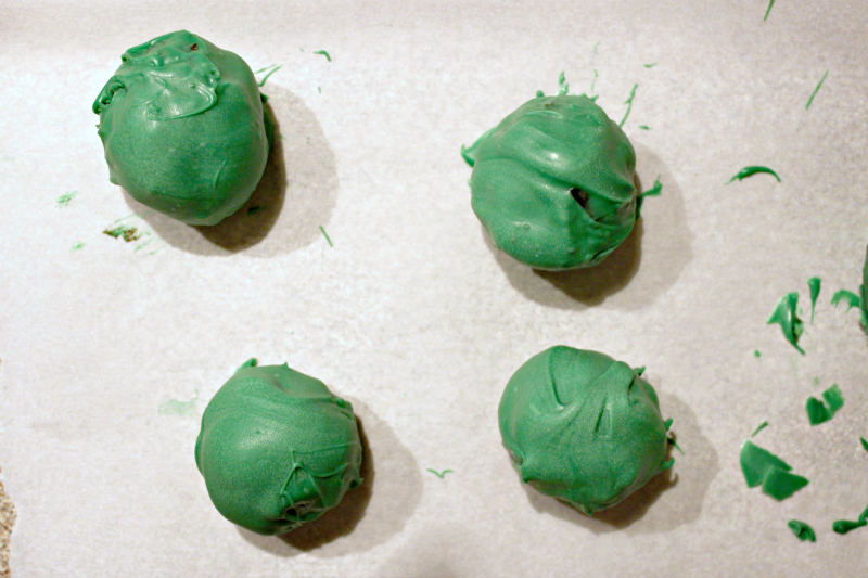 This OREO Cookie Balls Grinch Tree is easy and simple to make, but adds some great flair to your holiday tablescape!