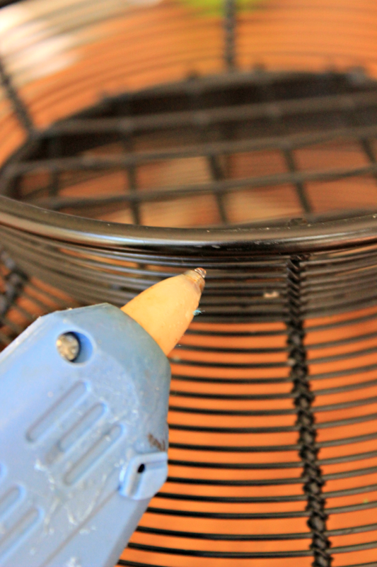 rope-wrapped-wire-glue-gun - C'mon Get Crafty Try an easy update on a frugal find. Wrap a basic wire bowl in rope and add a custom look to your kitchen!