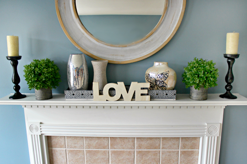 Clean Green Mantel Decor - C'mon Get Crafty Need some inspiration for mantel decor now that the holidays are over? See how I used boxwood to style a fresh look for my after Christmas mantel.