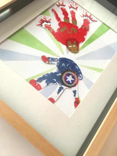 My son loves the Avengers, but I love making art meaningful. So we struck a compromise with this superhero handprint art!