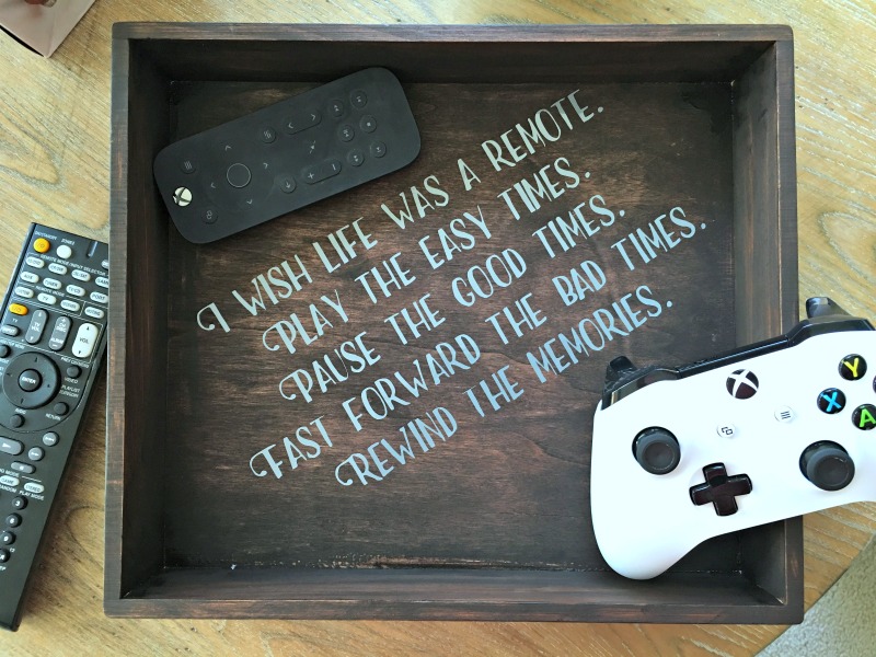 For this month's thrift store up cycle I decided to make use of an old box to store the hundreds of remotes we own. 