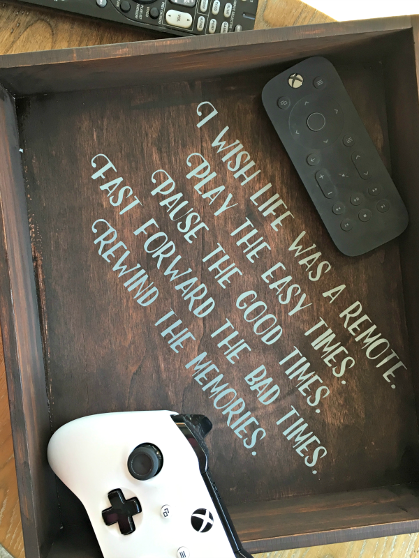 For this month's thrift store up cycle I decided to make use of an old box to store the hundreds of remotes we own. 