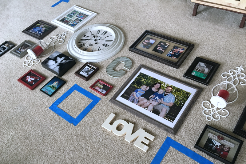 Gallery Wall Update 10 - C'mon Get Crafty If you are tired of your bland gallery wall with symmetrical pictures and no flair, then check out what I used to update mine! #CraftRoomDestash