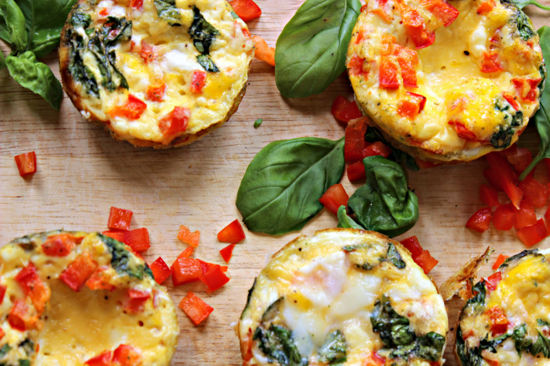 Red Pepper, Basil, Feta Egg Muffins3 - C'mon Get Crafty Mix up your breakfast routine with these healthy and delicious egg muffins! Red pepper, basil, and feta make a striking combination with a low calorie impact.