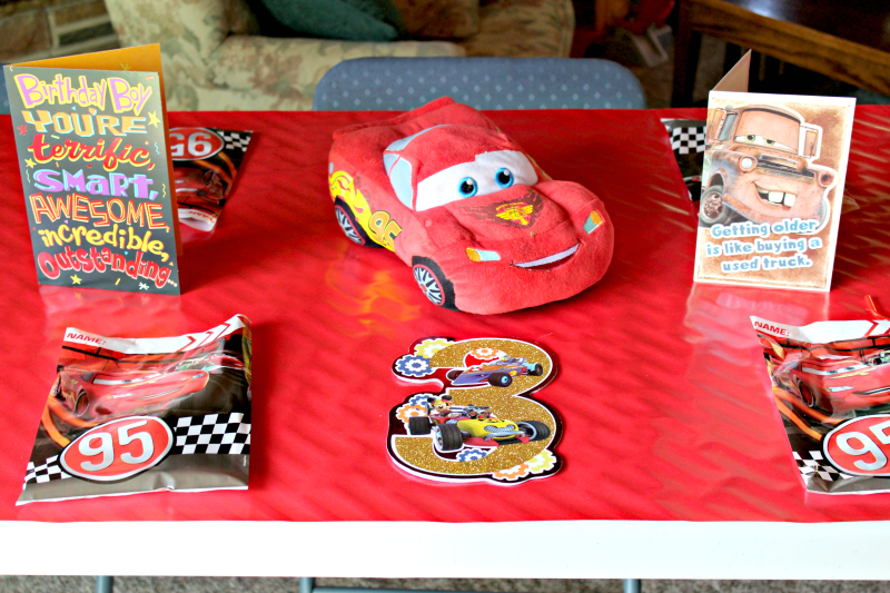 My 3 year old wanted a Disney CARS birthday party this year, so I worked up some easy party decorations and the BEST homemade cake design! #ad #CARSbirthdayparty