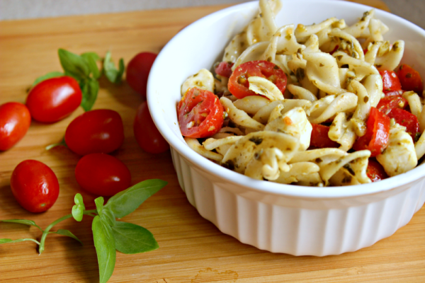 When trying to determine a good dish to bring to a Labor Day BBQ or just a refreshing meal during the hot summer days, look no further than this super simple Pesto Pasta Salad! Using low carb noodles, you don't even have to feel guilty about it!