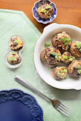 These delicious, low carb bacon cream cheese stuffed mushrooms will FLY off the plate, so make sure to make plenty!! Perfect for party appetizers or tailgating!