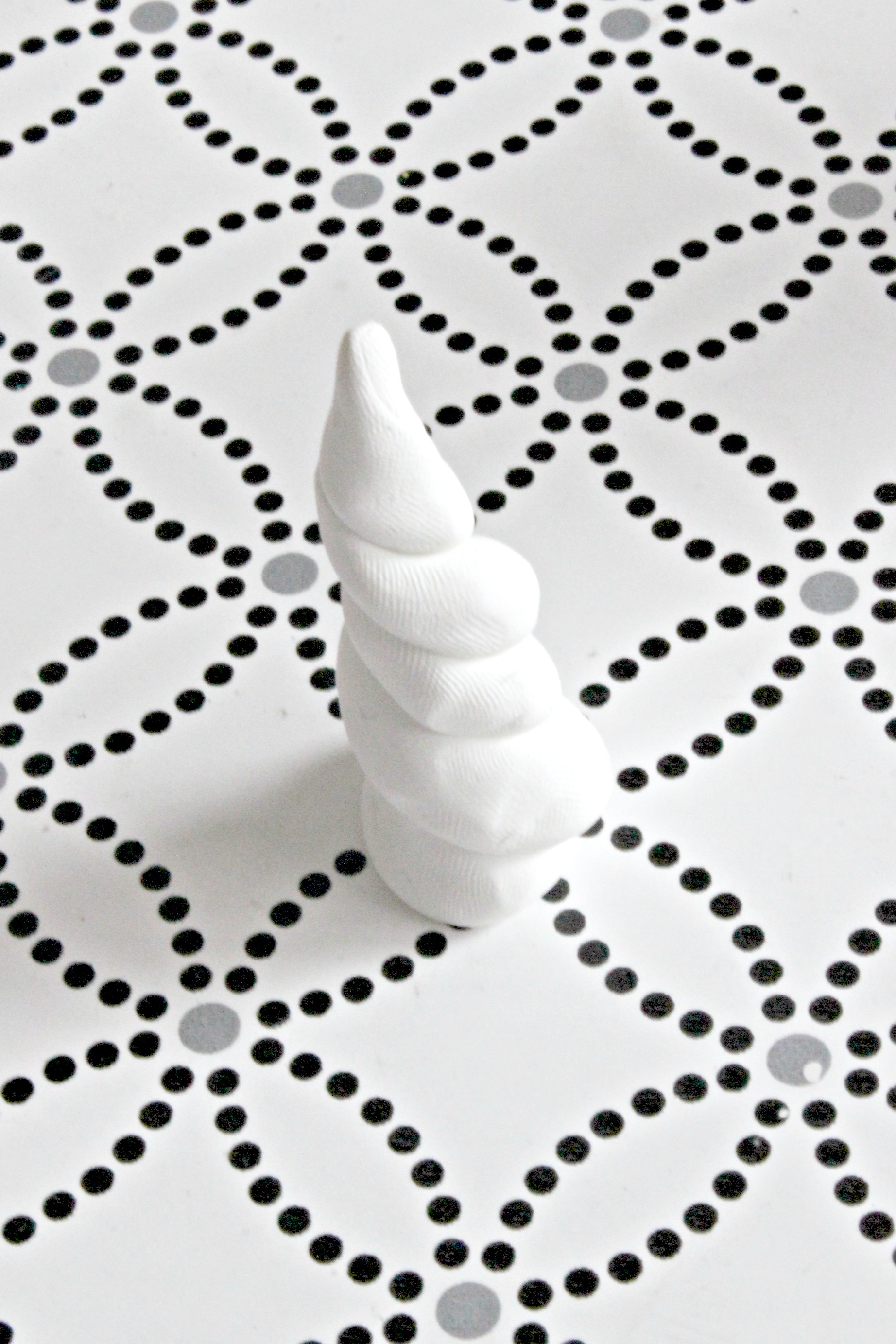 Polymer Clay Unicorn Horn Baked - C'mon Get Crafty A little glitter and a little creativity creates a fabulous, sparkly unicorn ornament! See how you can make one as well! #christmas #ornamentdiy #unicorndiy