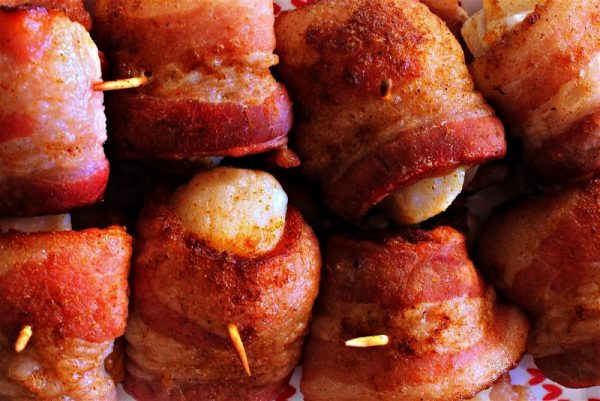 Bacon paprika wrapped scallops-opt These bacon wrapped scallops will be the hit of your next party! The bacon is soaked in Coca-Cola for an added layer of rich flavor that can't go wrong! #LayerOnLove #ad