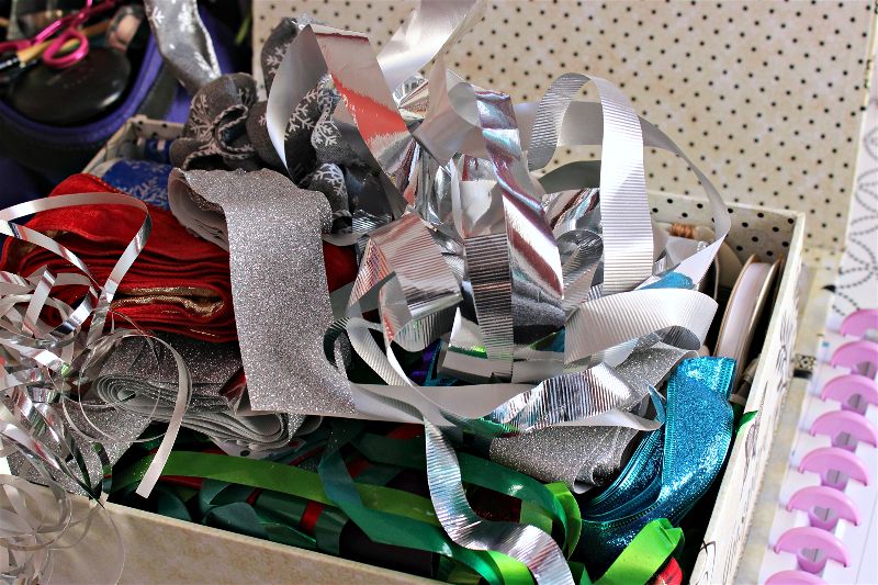 CRC #3 Messy Ribbon Storage-opt - C'mon Get Crafty Are you drowning in craft supplies? Do you have an overflowing stash of upcycle projects? Check out my rules to purge and organize your craft room!