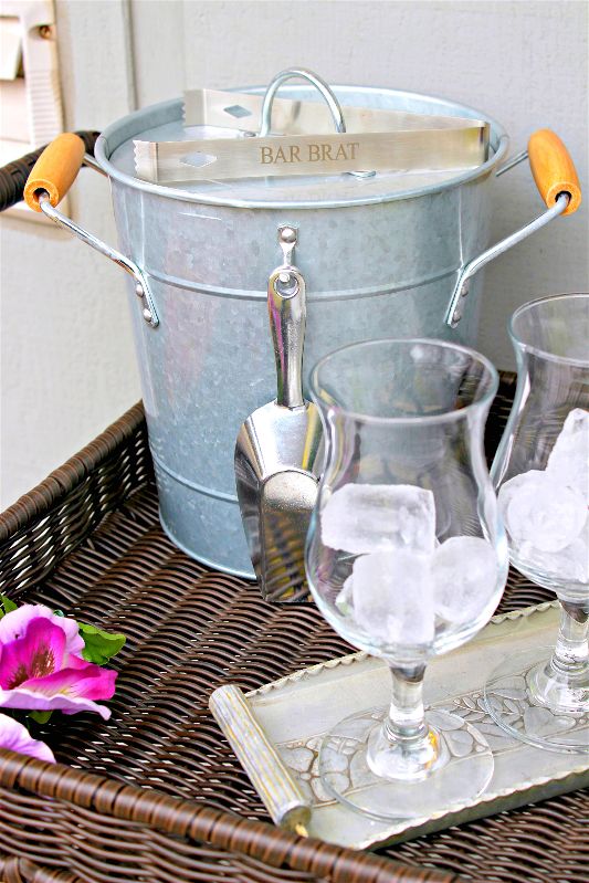 After the long Chicago winter, I'm SO ready to embrace the warmth of spring! Spend as much time outside as you can by styling a spring bar cart, always ready for outdoor entertaining! #ad #Wayfair #spring #barcart #sangria #springdecor