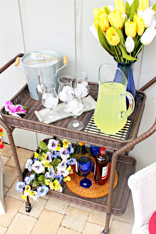 Top corner view Spring bar cart-opt - C'mon Get Crafty After the long Chicago winter, I'm SO ready to embrace the warmth of spring! Spend as much time outside as you can by styling a spring bar cart, always ready for outdoor entertaining! #ad #Wayfair #spring #barcart #sangria #springdecor