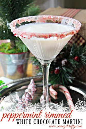 Try this delicious white chocolate martini rimmed in peppermint - the perfect chill this winter! #whitechristmas #christmasmartini #chocolatemartini #peppermintchocolate #25daysofchristmasmovies