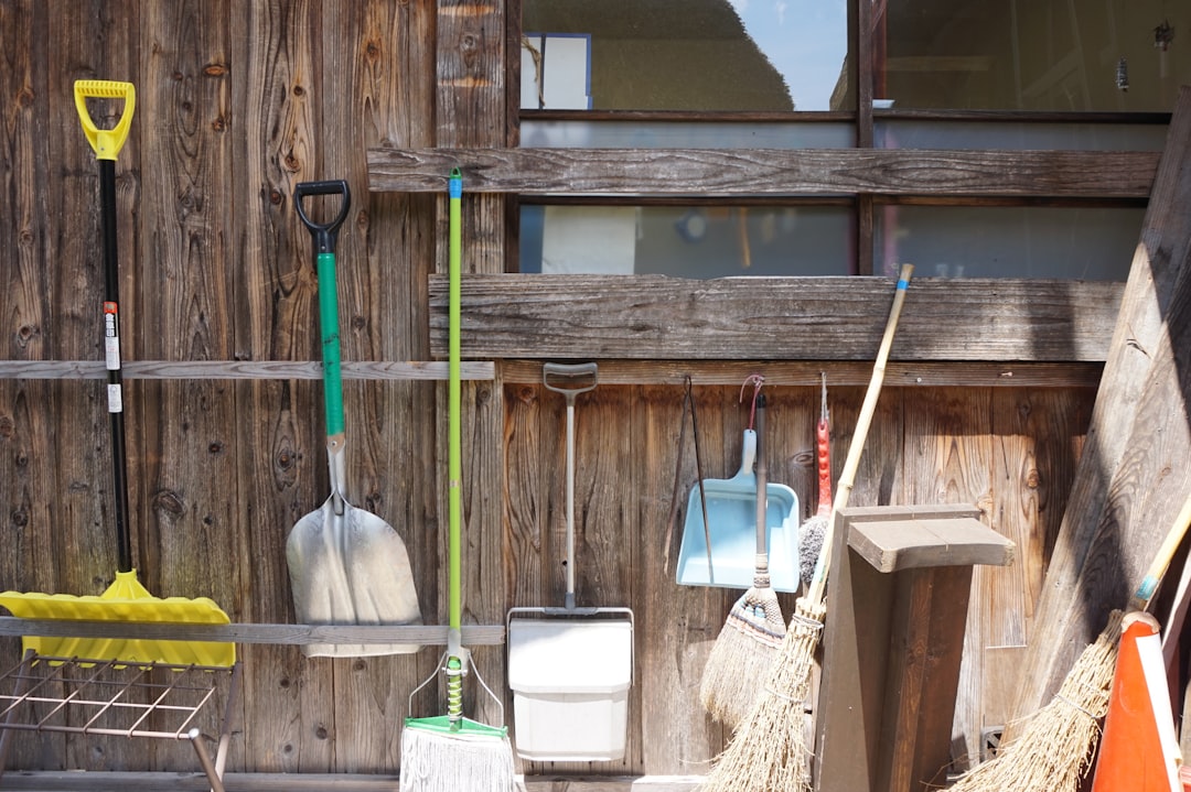Photo by Nadine Christy - C'mon Get Crafty white plastic bucket beside brown wooden wall