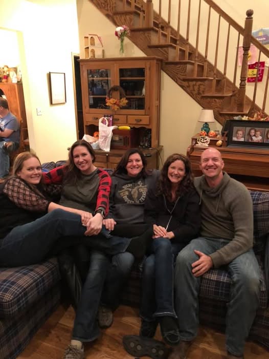Roommates Reunited - C'mon Get Crafty five adults sitting together on a couch, smiling